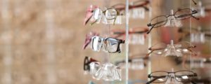Newest glasses models being shown for sale next to a mirror