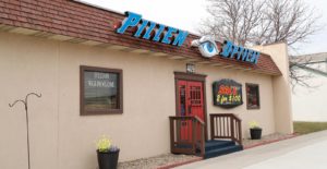 Pillen Optical with tan walls and a Sale 2 for $100 sign out front in Rapid City, SD